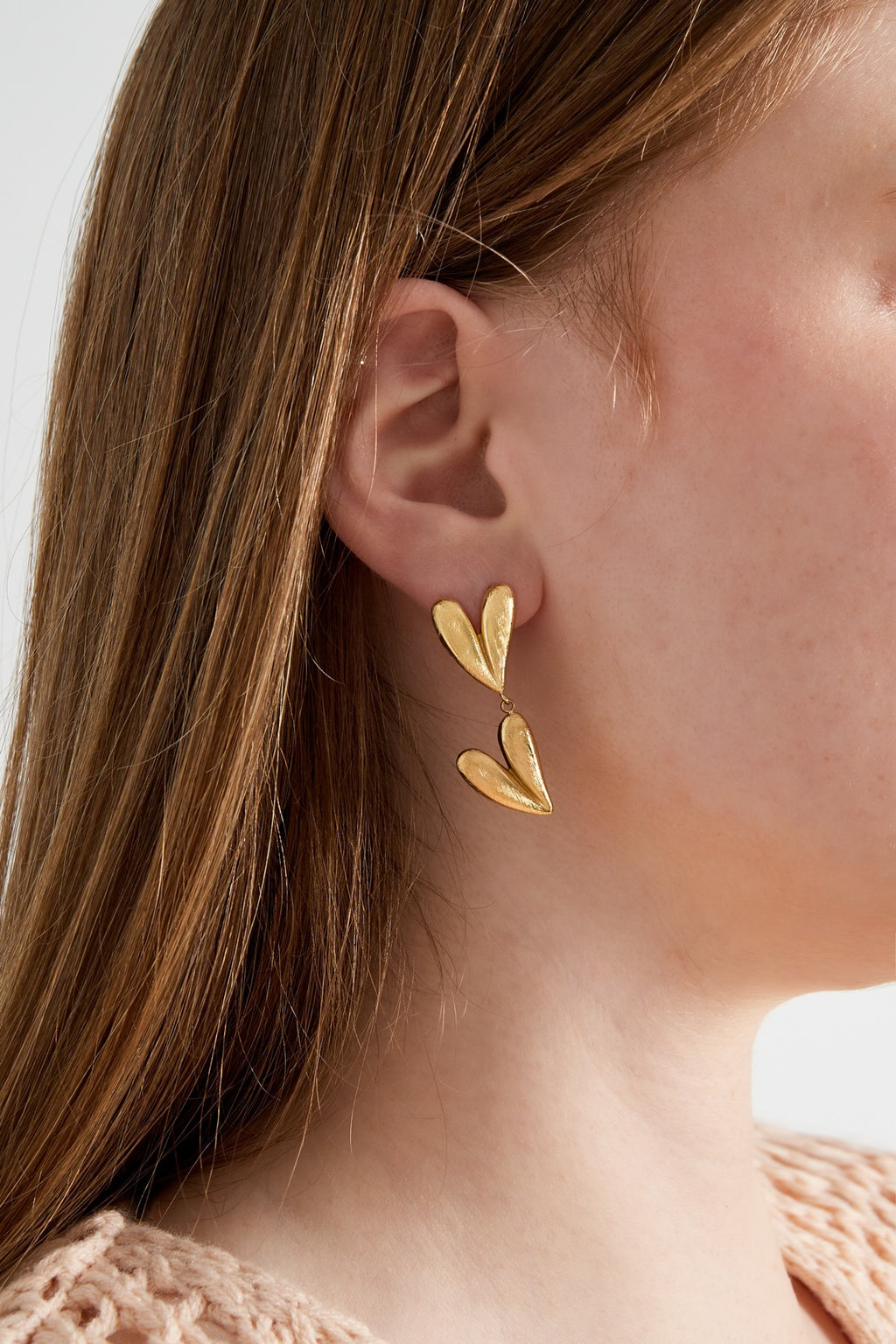 Double hearts oorbellen - goud