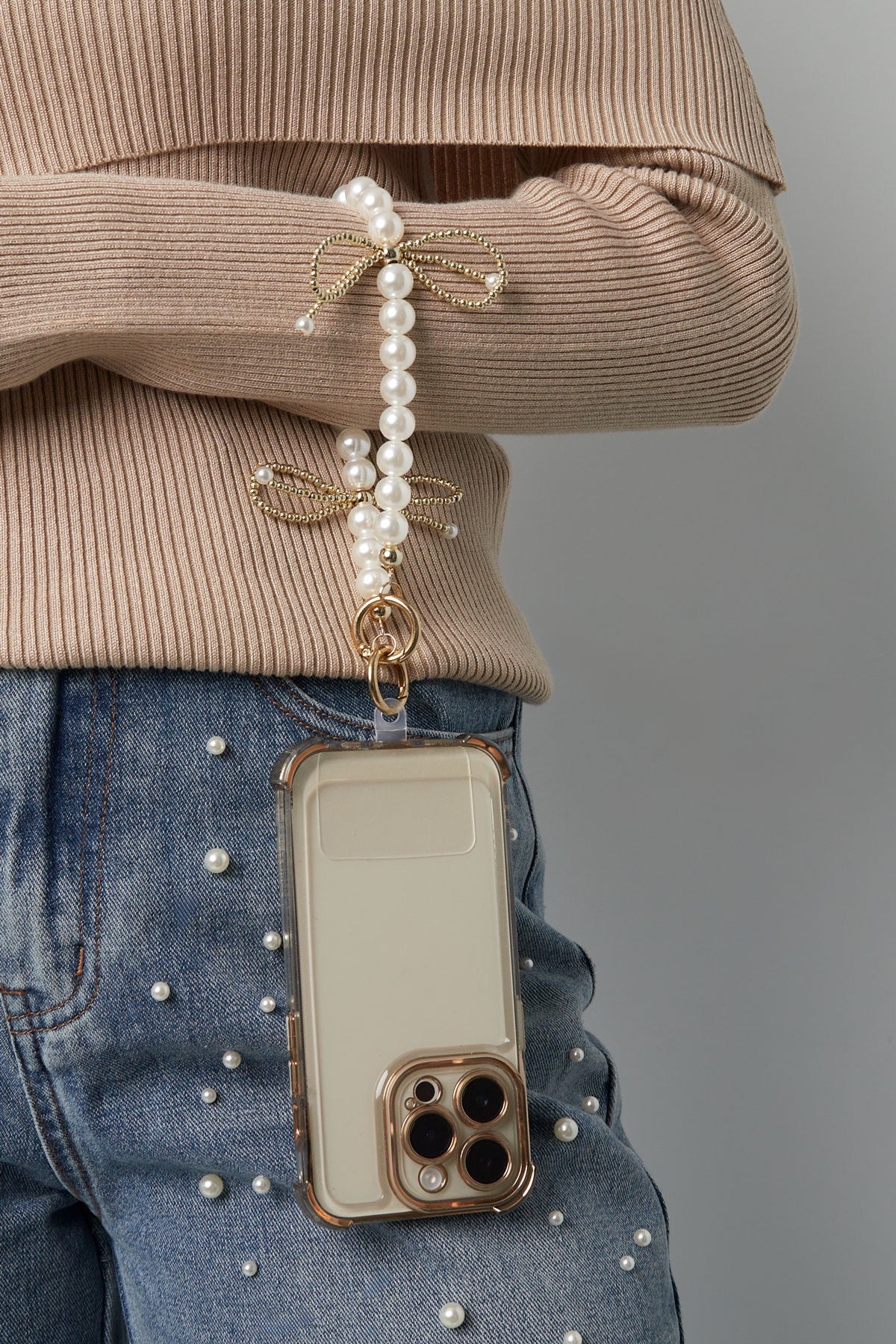 Pearl bowtiful telefoonkoord - goud