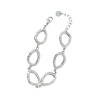 Spikey oval armband