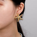 Seastar oorbellen - goud