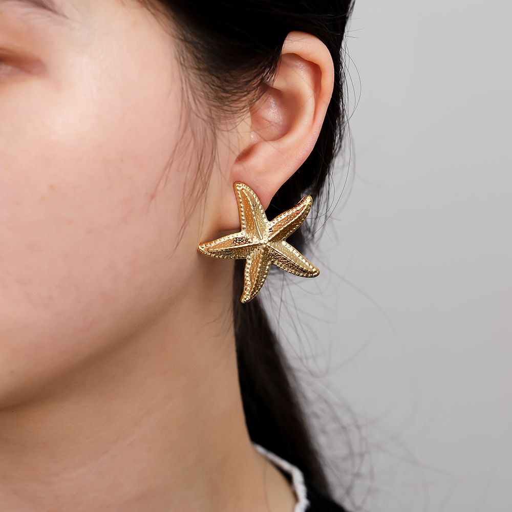 Seastar oorbellen - goud