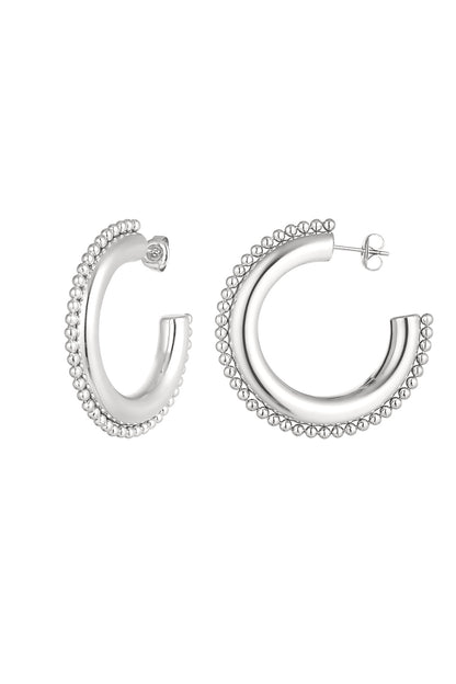Rond met dots oorbellen - zilver
