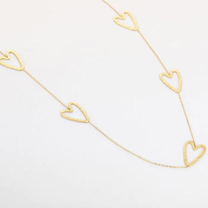 Lange ketting met hartjes - goud