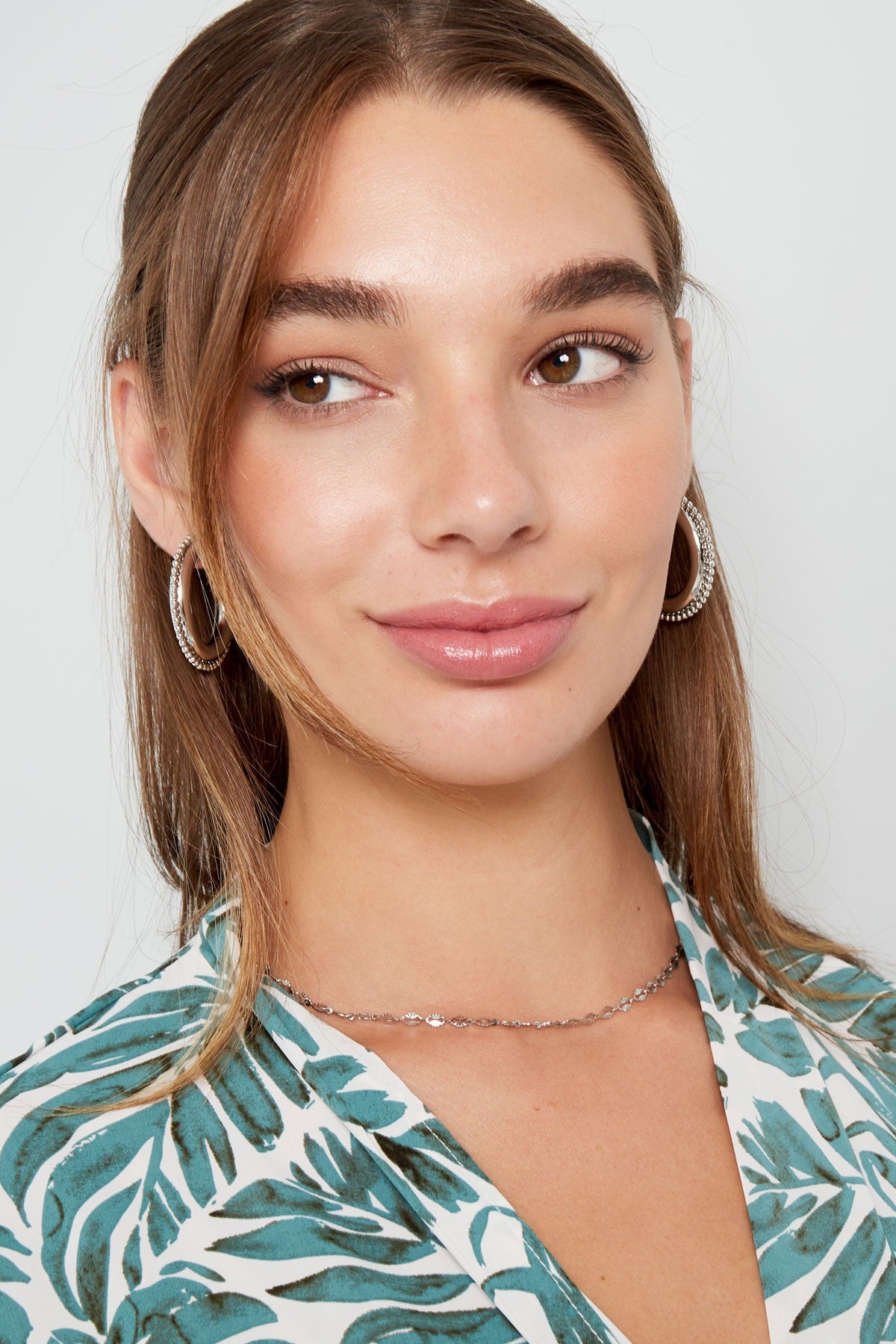 Rond met dots oorbellen - zilver