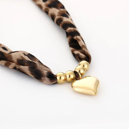 Panter met hart stof ketting - goud